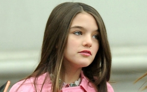 Suri Cruise Looks Fresh in Floral Dress on Lunch Date With Friend