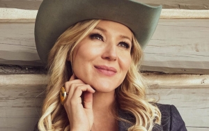 Jewel's Tour Bus Catches Fire in a Parking Lot 