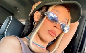 Doja Cat Hits Back at Trolls Saying She's 'Crazy' Shaving Her Head