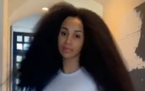 Cardi B Earns Praises After Flaunting Her Long, Natural Hair in New TikTok Video 