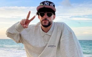 Bad Bunny Sparks Chatter After Kissing Female and Male Dancers at 2022 MTV VMAs