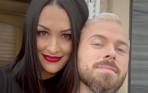 Nikki Bella and Artem Chigvintsev 'Can't Stop Smiling' as They're Finally Married