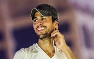 Enrique Iglesias Shares Passionate Kiss With Fan During Meet and Greet in Las Vegas