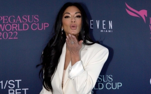 Nicole Scherzinger Almost Exposes Herself as Her Dress Drops Too Low