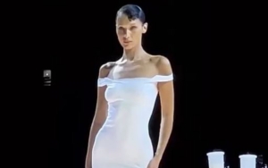 Topless Bella Hadid Gets Spray-On Dress on Runway at Paris Fashion Week