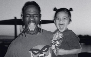 Travis Scott All Smiles During Father-Daughter Day With Stormi at Universal Studios Hollywood