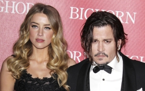 Amber Heard Possibly Spites Johnny Depp's Ancestry With Her Alias During Vacation