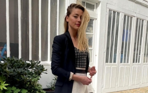 Amber Heard All Smiles in Bikini During Spain Beach Trip Months After Johnny Depp Trial