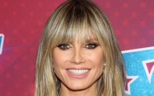 Heidi Klum Strips Down to Tease Her Halloween Costume