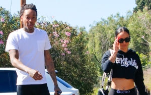 Wiz Khalifa Shakes Aimee Aguilar's Booty as They Dance in Front of Thanksgiving Meals