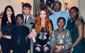 Madonna Rocks Sexy Low-Cut Dress as She Celebrates Thanksgiving With Six Children