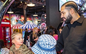 Drake Being a Stern Father to Son Adonis During Basketball Game