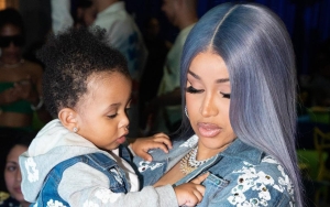 Cardi B Posts Adorable Video of Son Wave Running Around Huge Christmas Trees at Home