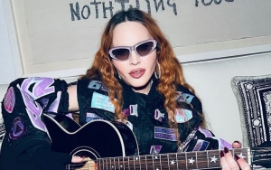 Madonna Teases New Music Is 'Coming Soon' With Sexy Wrinkle-Free Look