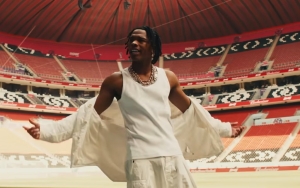 Watch Lil Baby Raps in Desert in Visuals for World Cup Song 'The World Is Yours To Take' 