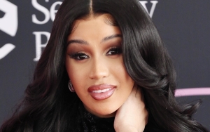 Cardi B Flashes Major Underboob in Sexy Christmas Dress