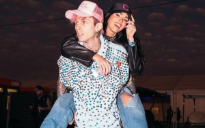Megan Fox Says She's 'Seeking a Girlfriend' With Cleavage-Baring Selfies, Machine Gun Kelly Responds