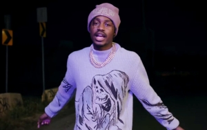 Lil Tjay Includes Footage of His Recent Gun Possession Arrest in 'Clutchin My Strap' Music Video