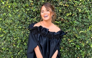 Chrissy Teigen Flashes Her Abs Two Weeks After Giving Birth to Third Child