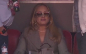 Adele Generates New Meme With Her Suited-Up Look at Super Bowl LVII