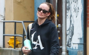 Olivia Wilde Labeled 'Attention Seeker' After Bizarrely Stretching Legs in Public