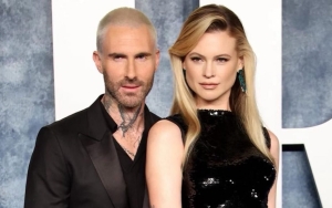 Behati Prinsloo Showers Adam Levine With Kisses at Disneyland on His Birthday After Sexting Scandal