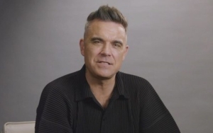 Robbie Williams Facing Potential Trademark Dispute Amid Plans to Launch Business Empire