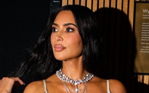 Kim Kardashian Turns Heads in Silky White Gown at Star-Studded TIME100 Gala