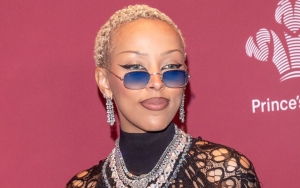 Doja Cat Unveils Huge 'Demonic' New Back Tattoo in Topless Pictures