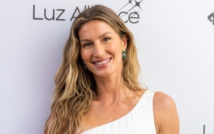 Gisele Bundchen Enjoys Paddleboarding in Bikini With Her Jiu-Jitsu Instructor