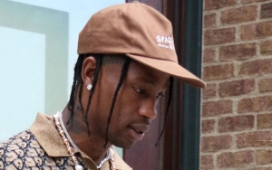 Travis Scott Gives His Shoes and Shirt to a Fan Rapping His Lyrics at Rolling Loud