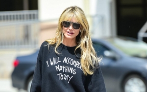 Heidi Klum Bares Skin in Daring Half-Dress at Paris Fashion Week