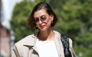 Hailey Bieber Quickly Removes Picture of Her Bare Tummy Amid Pregnancy Rumors