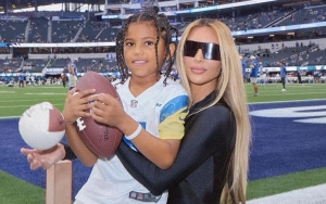 Kim Kardashian Reacts to Son Saint Flipping the Bird at Paparazzi