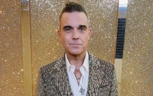 Robbie Williams Details His Battle With 'Manopause' 