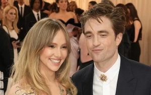 Suki Waterhouse Conceals Apparent Baby Bump in Oversized Hoodie During Outing With Robert Pattinson