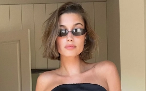 Hailey Bieber Puts on Busty Display in Skin-Tight Red Dress Ahead of 27th Birthday
