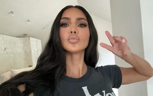 Makeup-Free Kim Kardashian Puts Her Middle Finger Up at Paparazzi in L.A. Outing