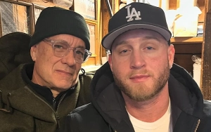 Tom Hanks Matches With Son Chet in Hoodies for Rare Photo After Christmas