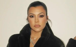 Kourtney Kardashian Flaunts Sparkling Nod to Newborn Son Rocky 