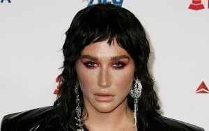 Kesha Steps Out in Los Angeles to Announce 'New Music Coming Soon' With Cardboard Sign