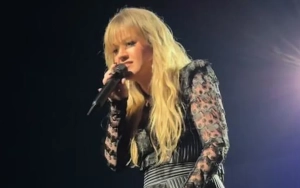 Kelly Clarkson Hilariously Blames Stylist for Her Struggle to Move in Tight Suit After Weight Loss