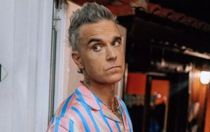 Robbie Williams Feels the Need to 'Disappear' After Landing Himself in 'Blank Space'
