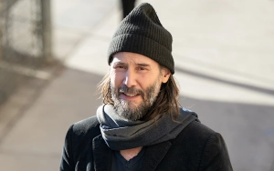 Keanu Reeves Struggles to Walk on Crutches With Ice Pack on His Knee During Filming Break