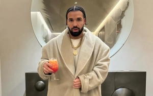Drake Jokes About Alleged Leaked NSFW Video in Front of Dad Dennis Graham at Concert
