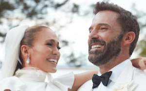 Jennifer Lopez Shuts Down Fan Theory About Her Movie Dress at Her Wedding to Ben Affleck