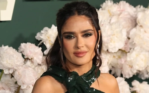 Salma Hayek Suffers Wardrobe Malfunction in Bathrobe in New Video