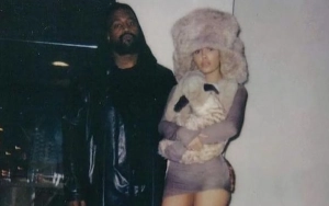Kanye West and Bianca Censori Rock Matching Jewelry Featuring Obscene Gesture at PFW