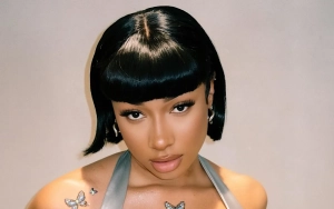 Megan Thee Stallion Disgusted as She Tastes Alcohol From Snake-Filled Bottle in Japan
