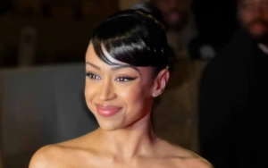 Oscars 2024: Liza Koshy Takes a Tumble in Towering Platform Heels on Red Carpet